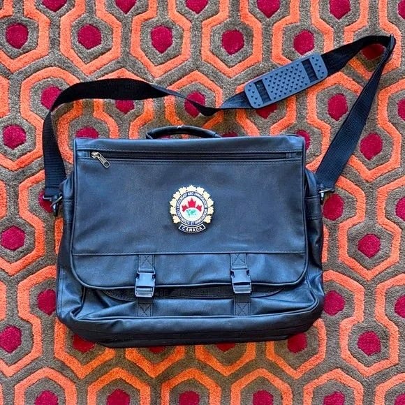 🏆 Classic Black Messenger Bag with Emblem