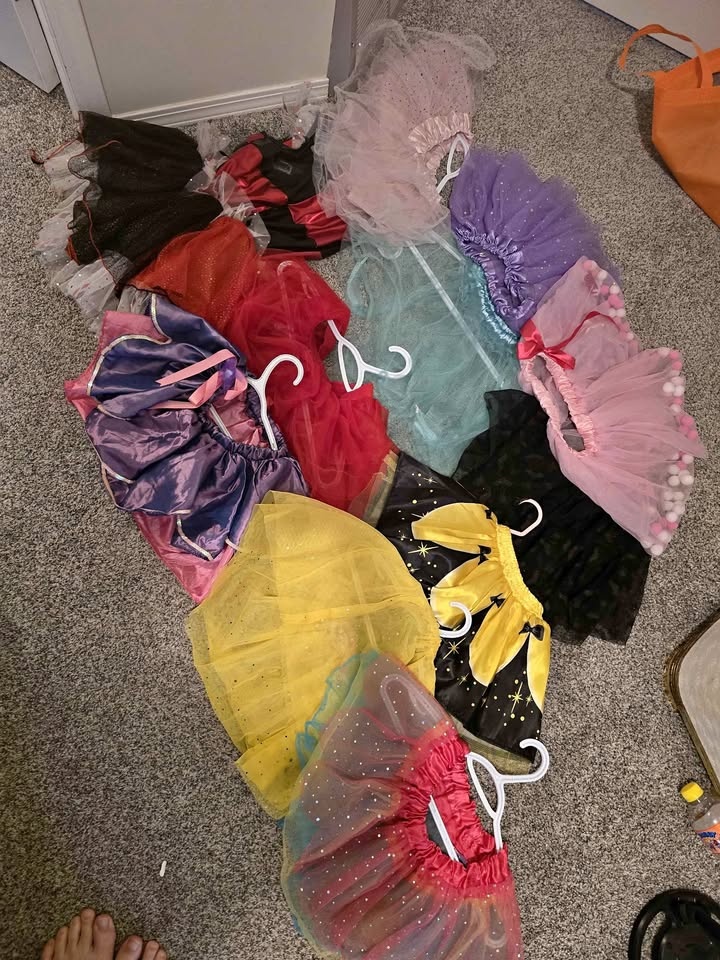 10 tutus and 1 dress