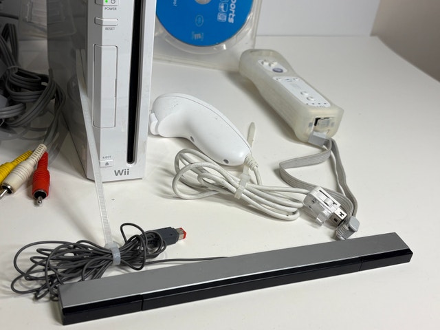 Nintendo Wii Bundle with Remote, Nunchuk, Game + Cables - photo 5