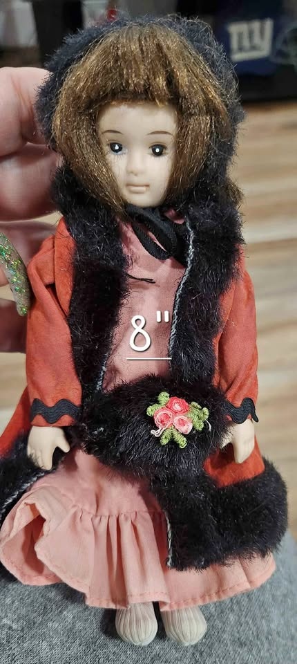Vintage porcelain and cloth doll