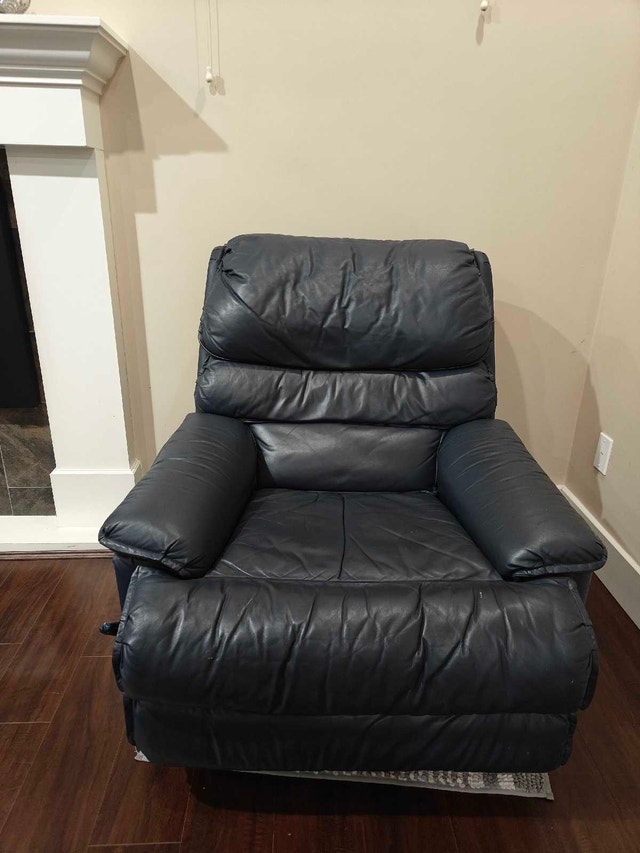 Dark blue leather recliner chair