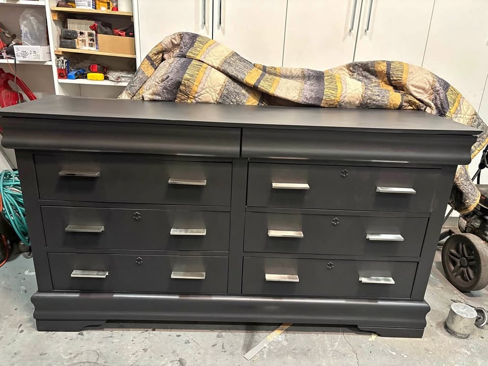 Beautiful black storage dresser with silver handles - like new