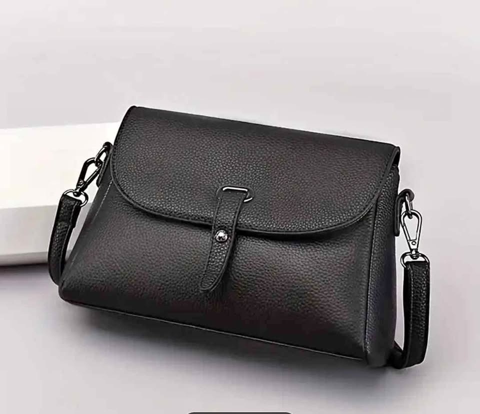 Brand new black color genuine leather hand bag for women