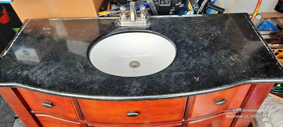 Washroom vanity with backsplash and mirror