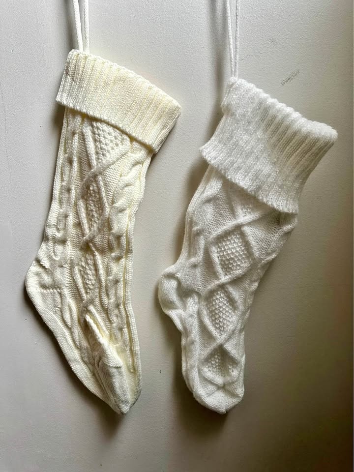 Two knit Christmas stockings