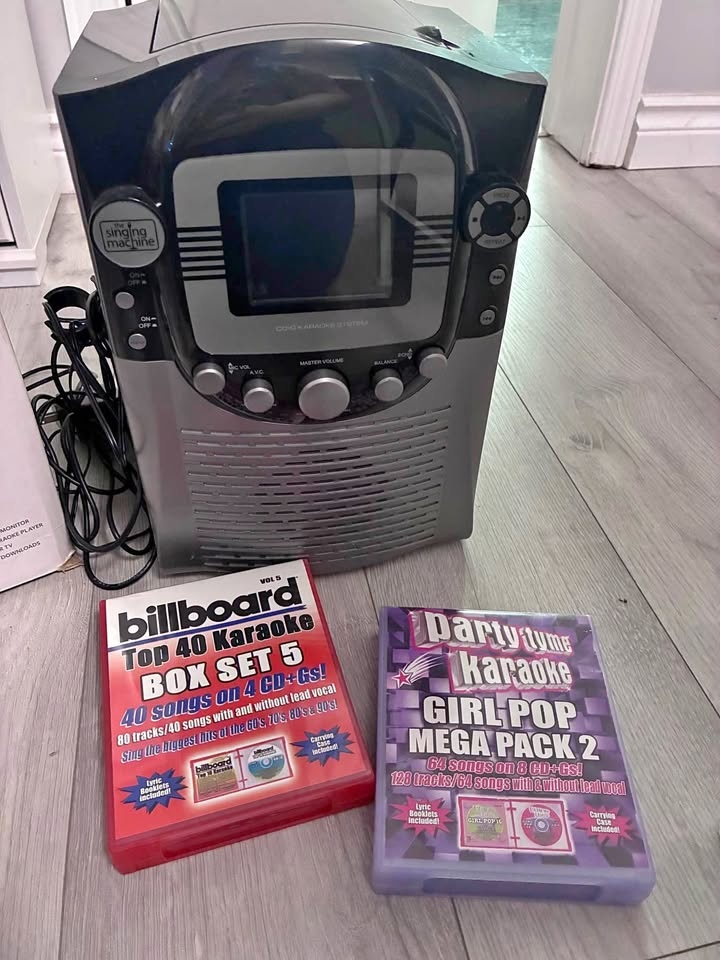 Singing Machine & 2 sets of Karaoke CDs