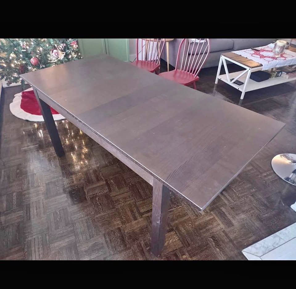 Dark wood extensible dining table
