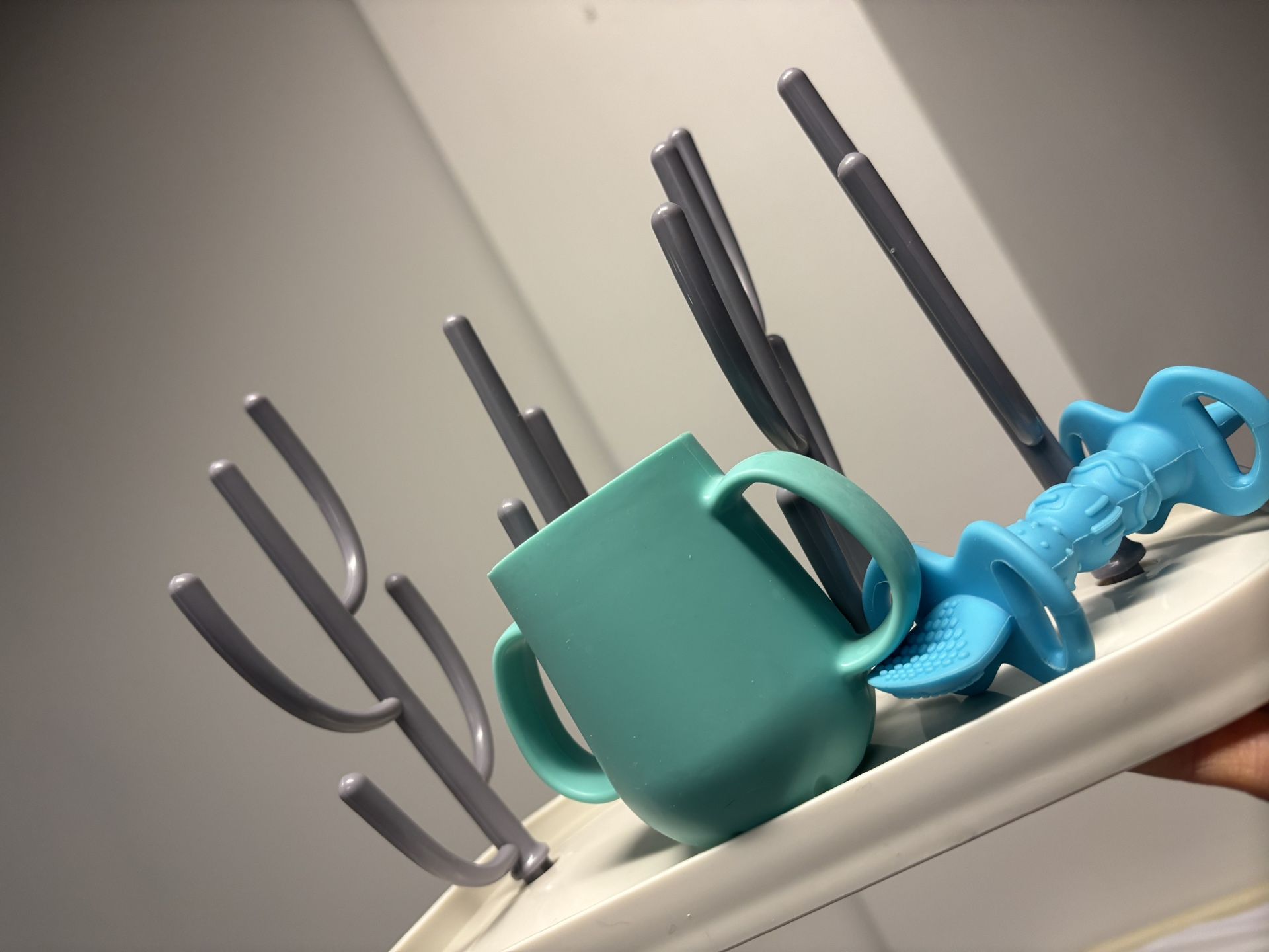 Bottle holder with cup and spoon