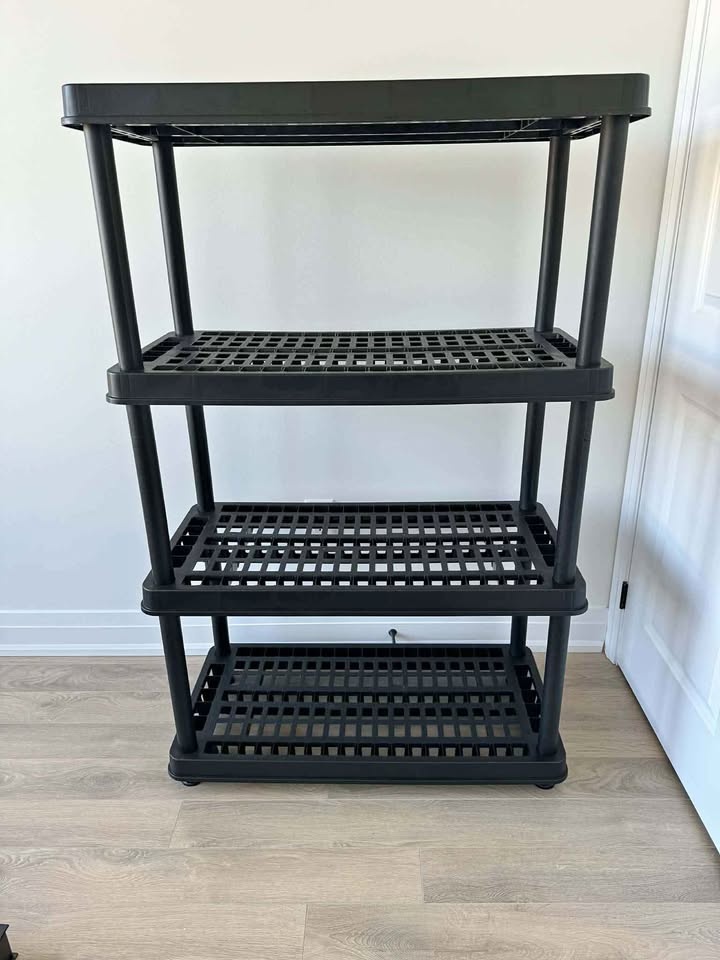 Three hard plastic storage shelving