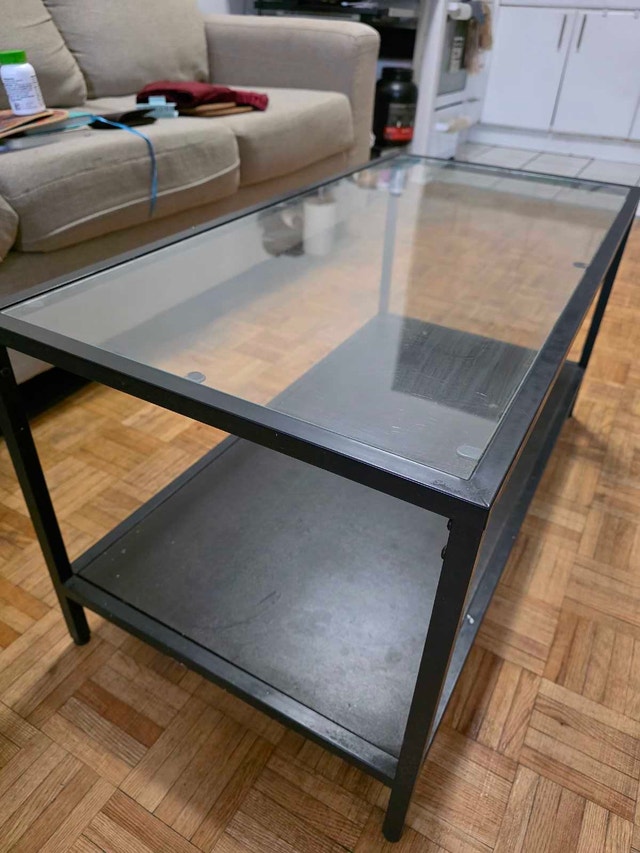 MOVING SALE - IKEA Glass top coffee table black frame