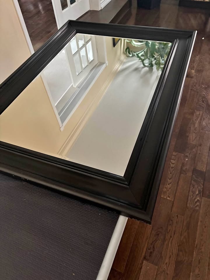 Gently used large framed mirror