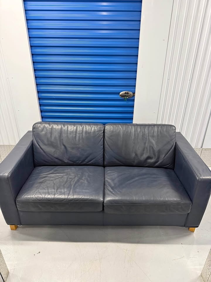 Navy Leather Sofa with Pull Out Bed