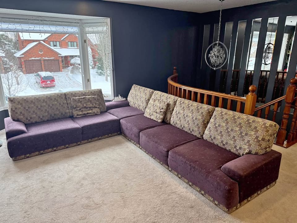 Purple Sectional Sofa with Patterned Cushions