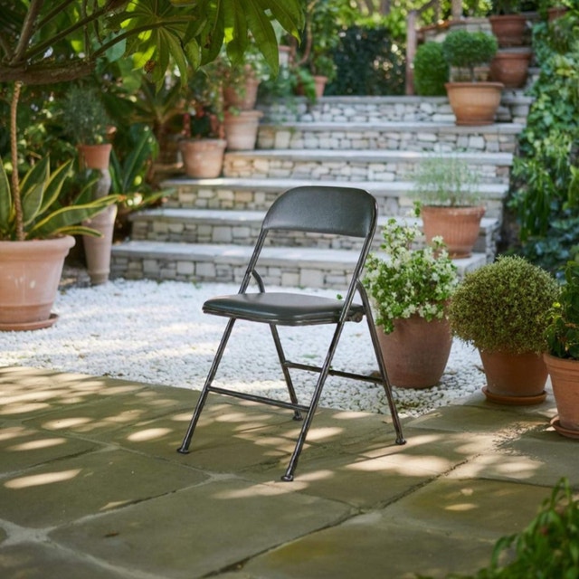 Moving out sale: Portable Vinyl Upholstered Folding Chair