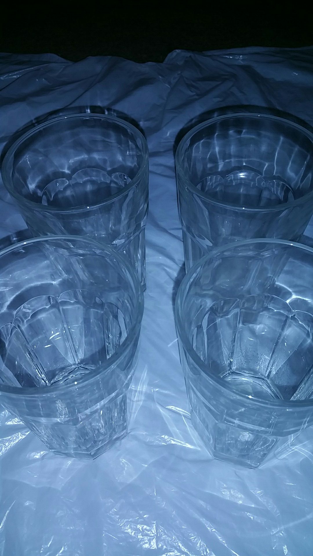 Set of 4 new clear drinking glasses, 5"tall