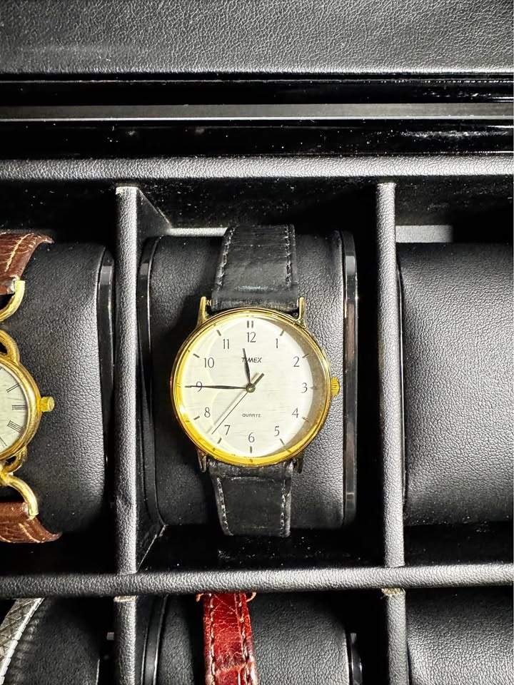 Vintage gold-tone Timex analog quartz watch