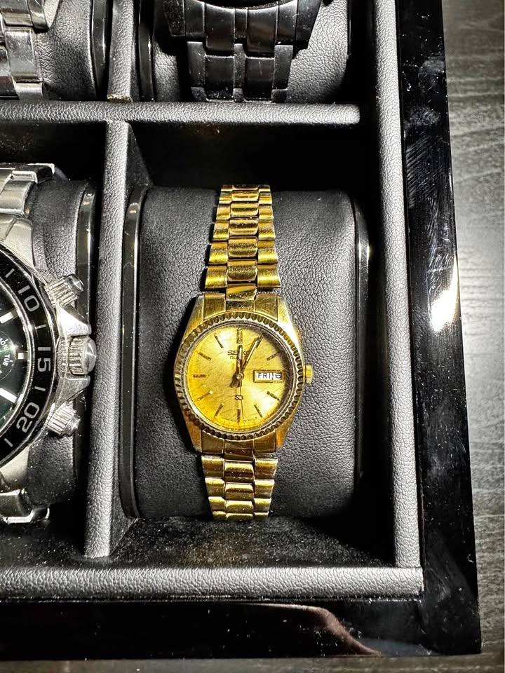 Vintage gold-tone Seiko Quartz day-date watch