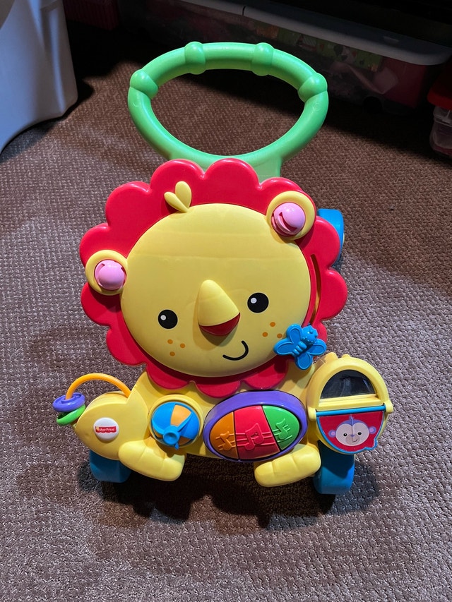 Fisher Price Musical Lion Walker