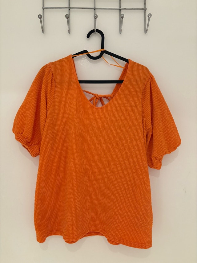 Orange top with tie back - women’s medium