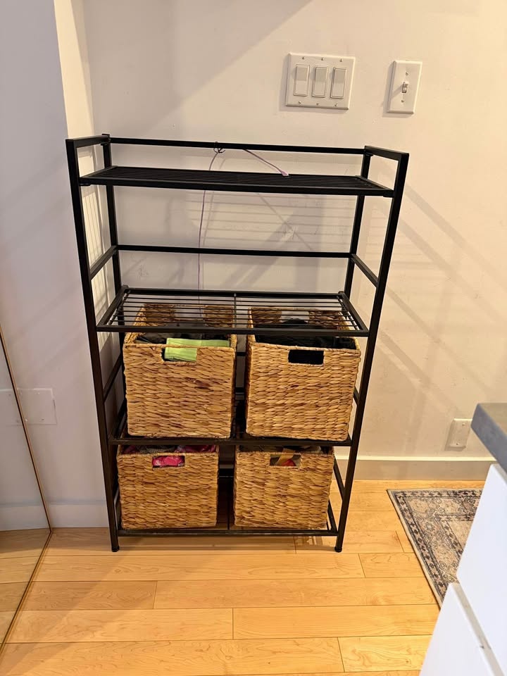Iron shelving unit with baskets