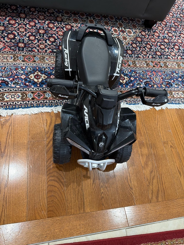 Ride on racing ATV for toddler kid lights and sound work well
