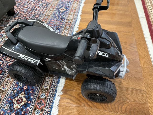Ride on racing ATV for toddler kid lights and sound work well - photo 2