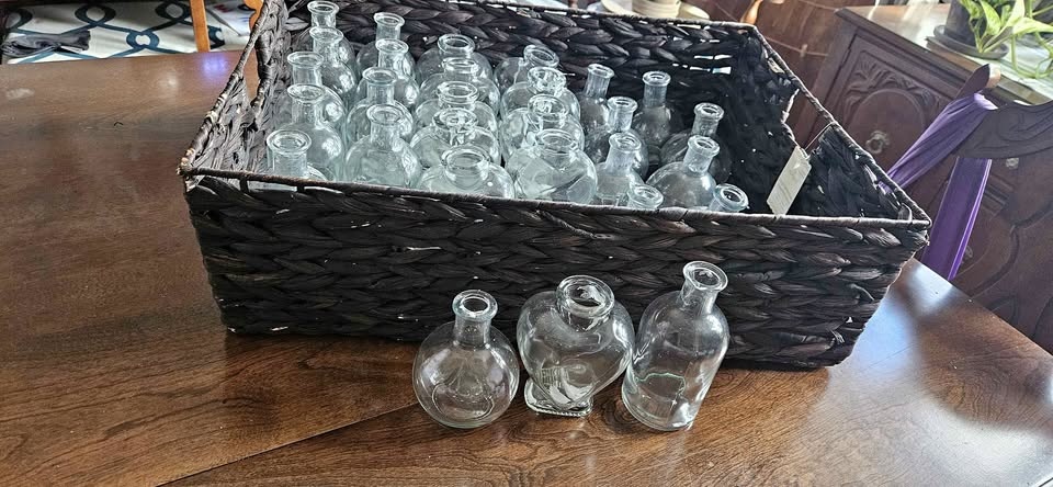 Glass bottles and basket