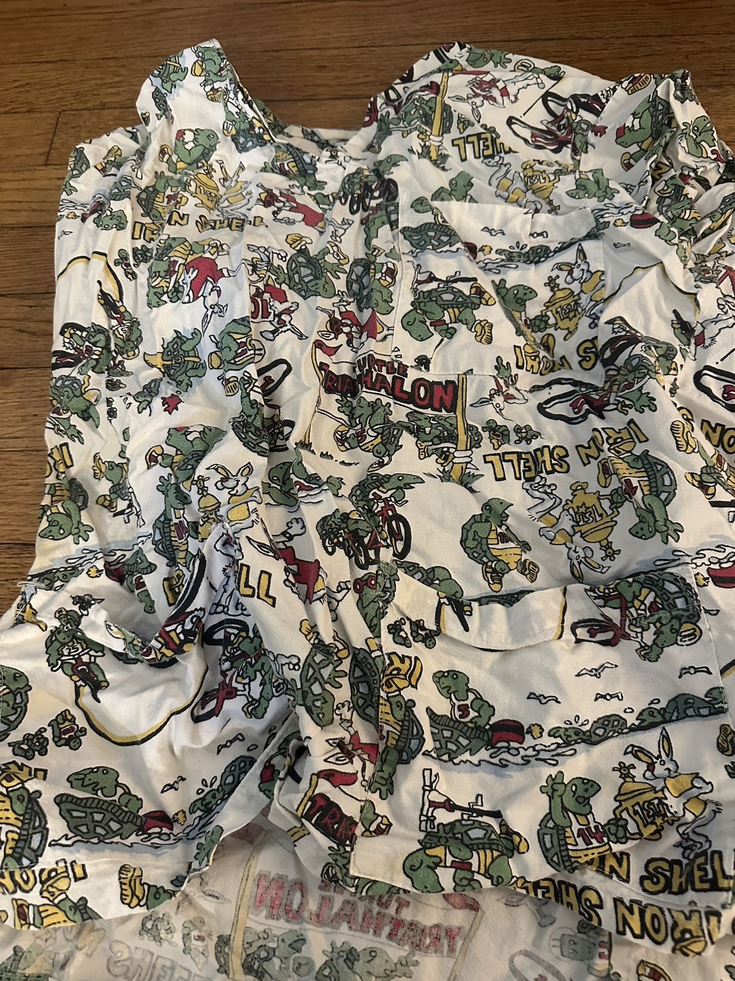 Women’s Small Scrub Top Racing Turtles