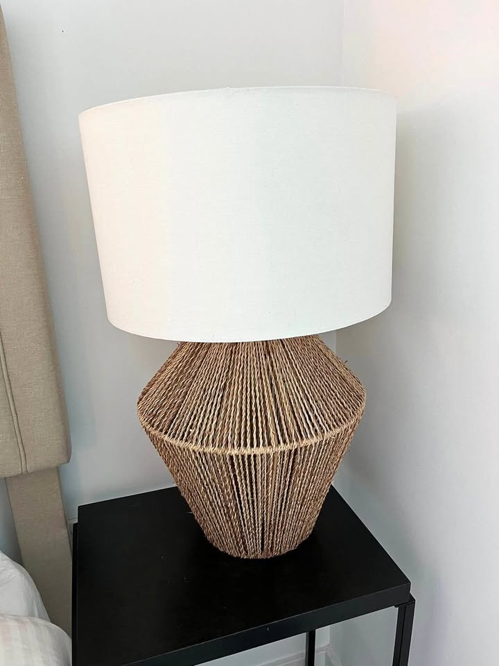 Woven base table lamp with white shade