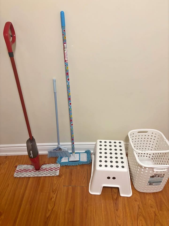Mops and Ikea table with laundry basket