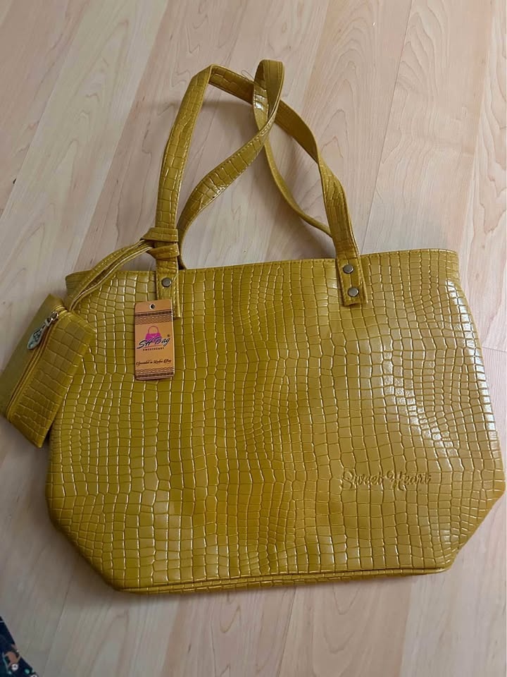 Handbag New with attached small wallet
