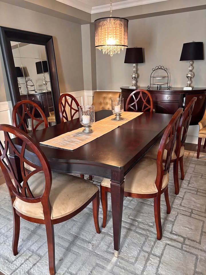 Solid wood dining table. dark wood finish.