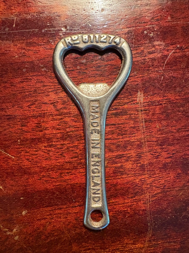 Antique Woodroofe's cast iron bottle opener.