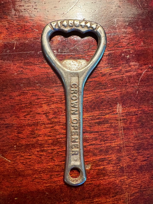Antique Woodroofe's cast iron bottle opener. - photo 2