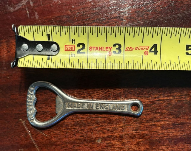 Antique Woodroofe's cast iron bottle opener. - photo 3