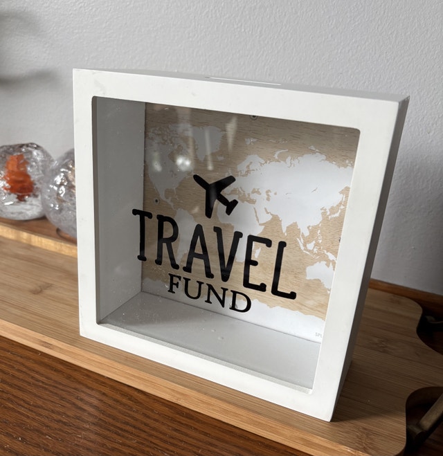 TRAVEL FUNDS bank accent decor.