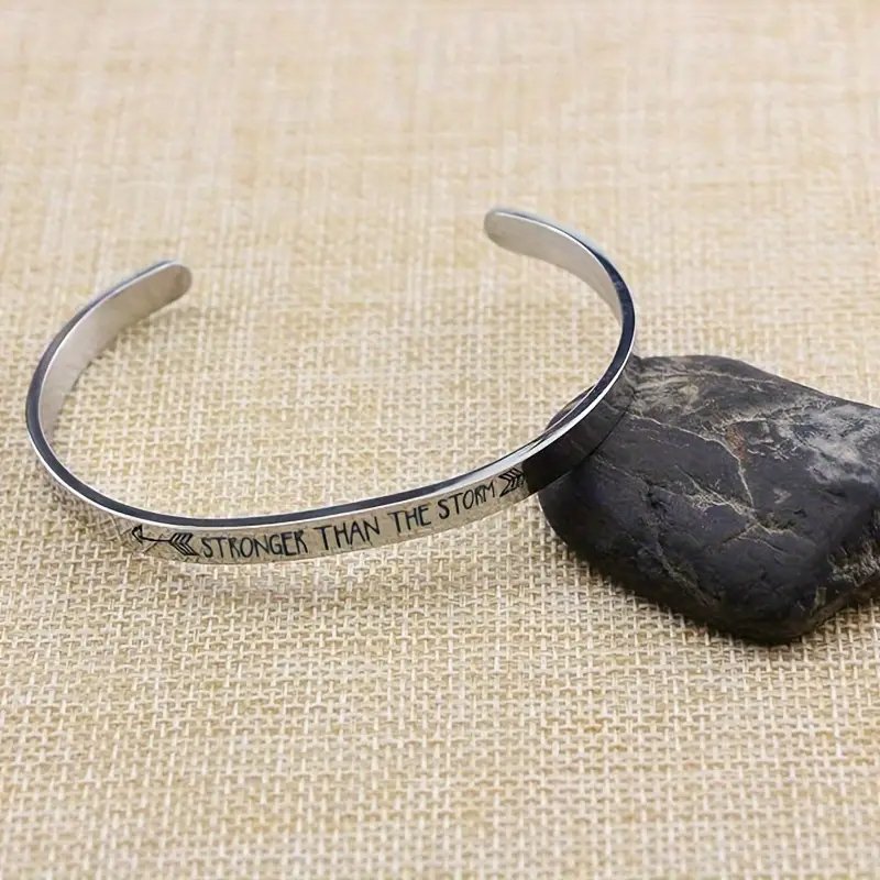 'STRONGER THAN THE STORM' Engraved Stainless Steel Open Bracelet - photo 2