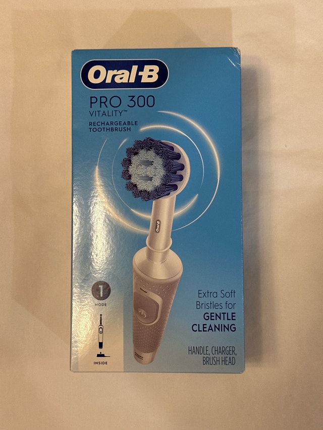 Brand new in box Oral B Pro300 Vitality rechargeable toothbrush
