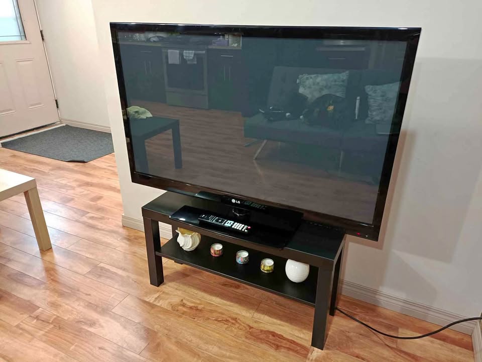 54" LG TV with table
