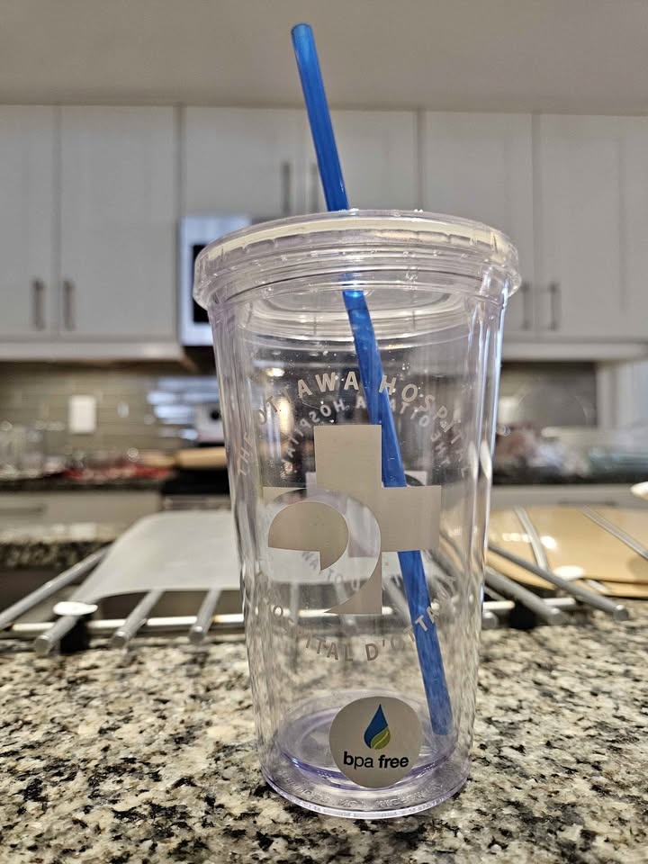 Clear tumbler with blue straw BPA free