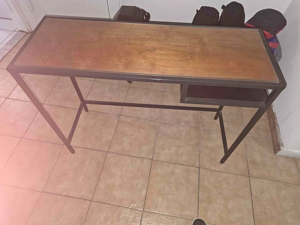 Glass table with metal frame