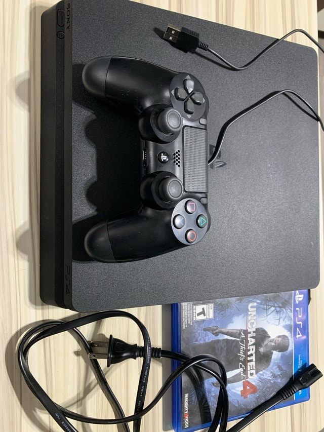 Playstation 4 Slim 500 GB with Uncharted 4
