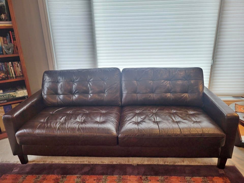 2 Leather Sofas and Ottoman