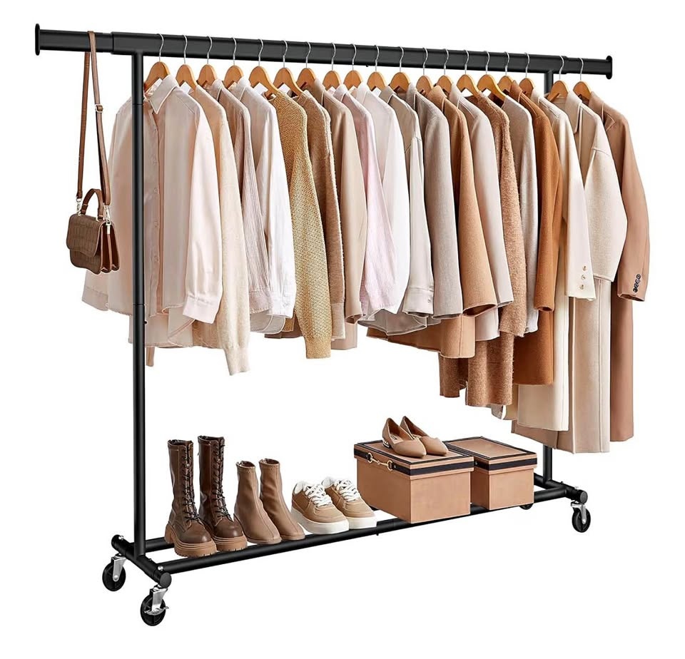 Almost New: large Clothes Hanging Rack with Wheels