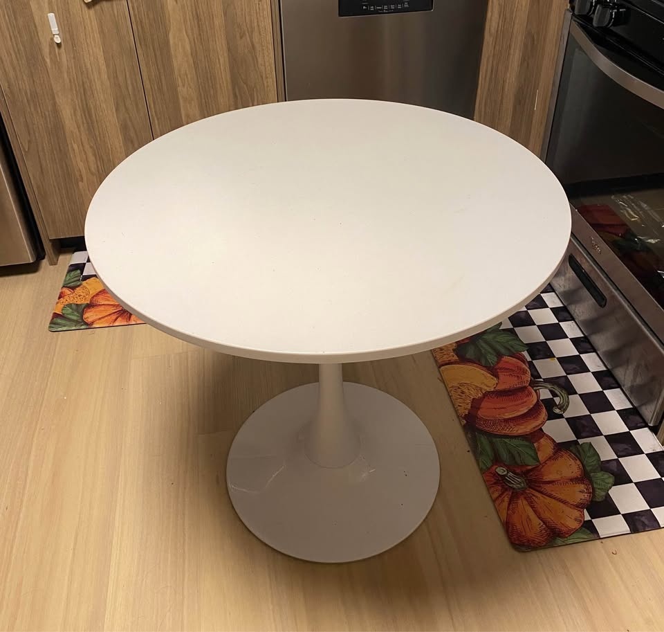 Round dinner table with metal base - photo 2