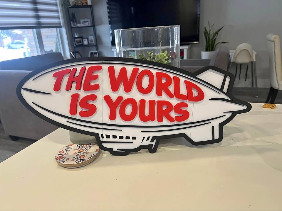 The World Is Yours Blimp Sign