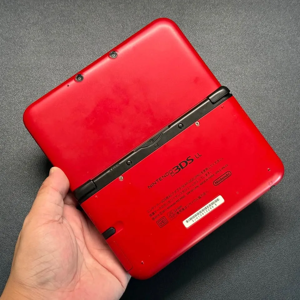 Nintendo 3DS XL – Red/Black (Fully Modded, 64GB) thumbnail