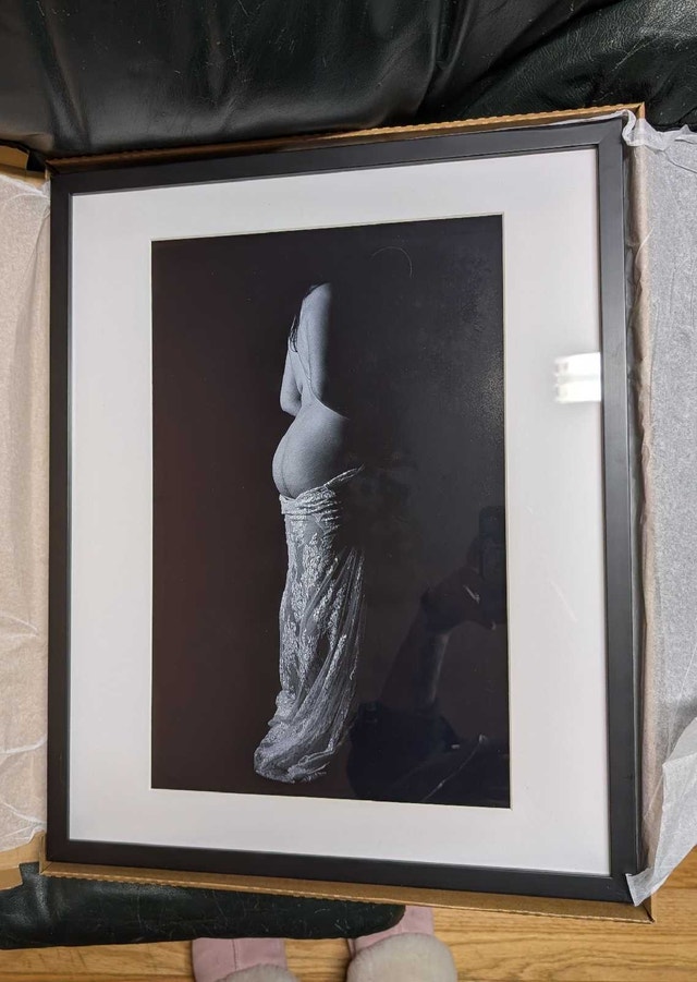 Framed print of a woman's figure