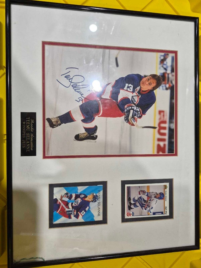 Teemu Selanne Rookie Cards and Autographed Photo Display