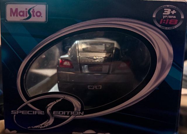Maisto 1:18 Scale Chrysler Crossfire - photo 4